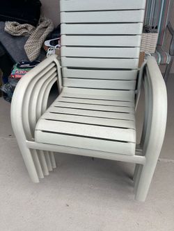 Five patio chairs