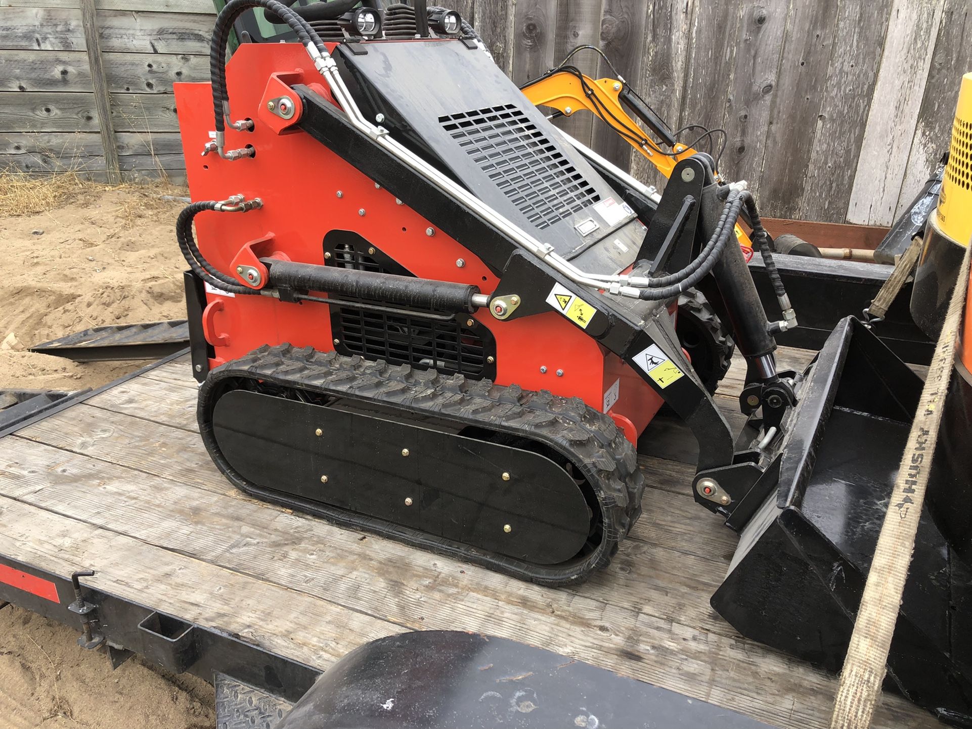 New Mini Skid Steer On Tracks 42 Inches Wide  Grapple, bucket and forks are available 