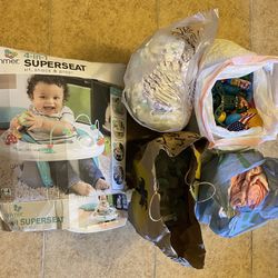 Miscellaneous Baby Items: Baby Chair, Diapers, Clothes, Toys, Bottles