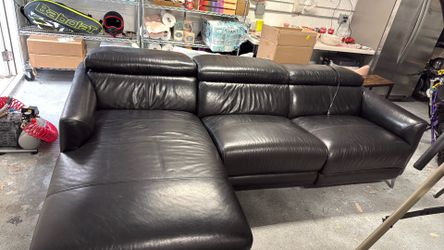 Three sitter leather mechanical couch