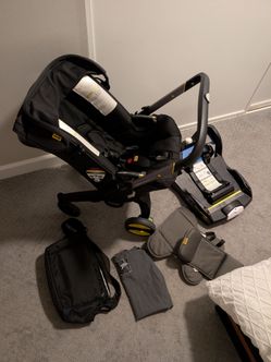 Doona Car Seat & Stroller Combo - Great Condition (Includes Base & Accessories)