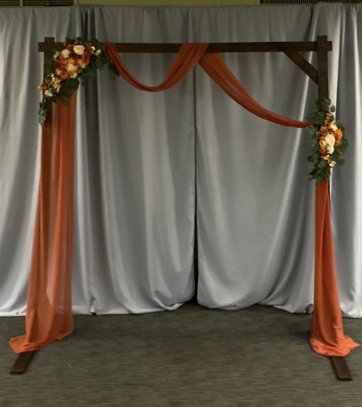 Burnt Orange Drapery With Flowers