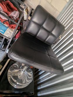 Black leather bar stools adjustable height $35 each or $60 for the pair