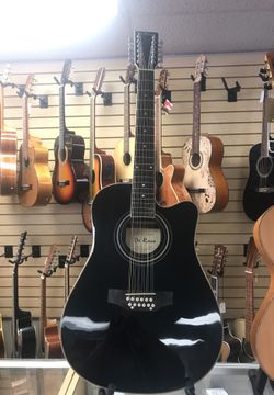 12 CUERDAS DE ROSA ACOUSTICO/ELECTRICO GUITARRA. ( VIENE EN NEGRO,ROJO,NATURAL,AZUL, Y DE SOL). TAMBIEN VIENE EN EZQUIERDA.