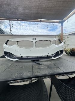 Used OEM BMW front bumper alpine white. 3 series. 4 series
