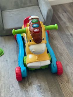 V tech ride toy