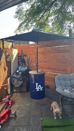 Dodger umbrella holder and storage