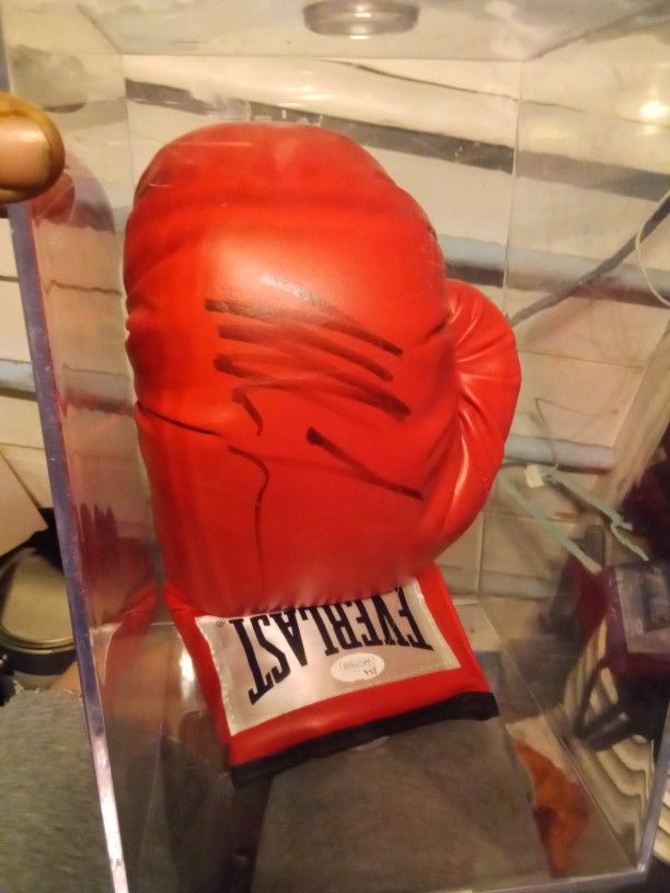 Red Everlast boxing glove personally signed by Mike Tyson