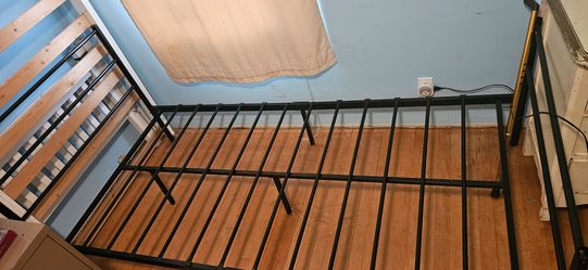Metal twin bed frame.