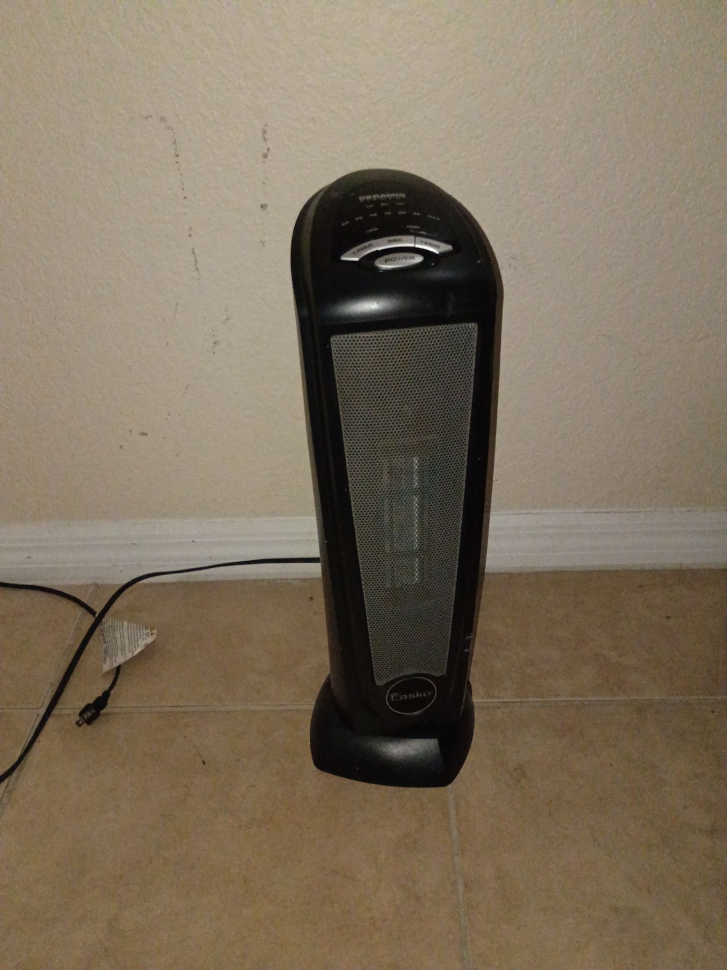 Portable room heater and air conditioner
