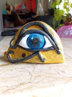 Eye of Ra Egyptian Shelf sitter