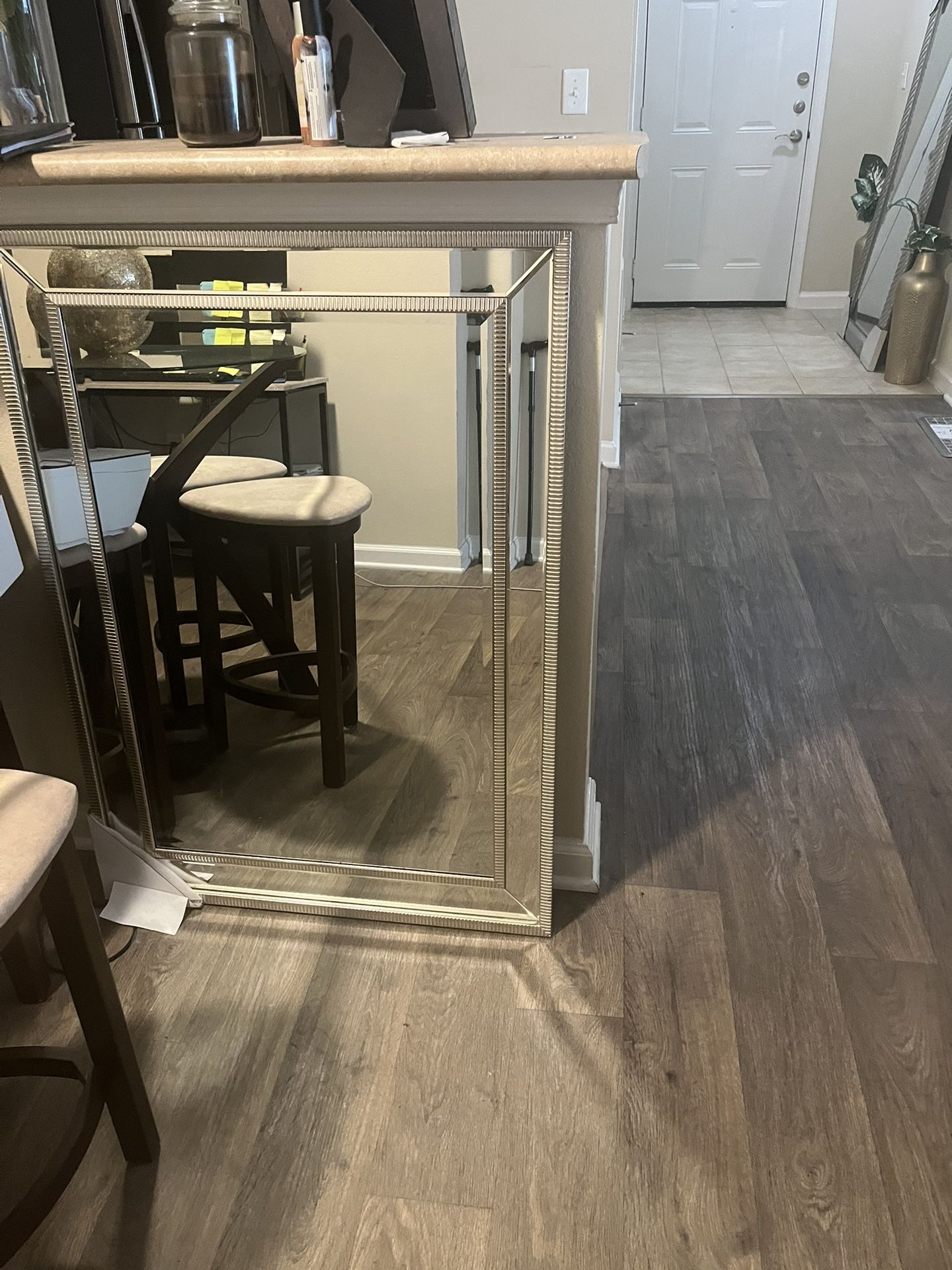 Mirror with gold trimming