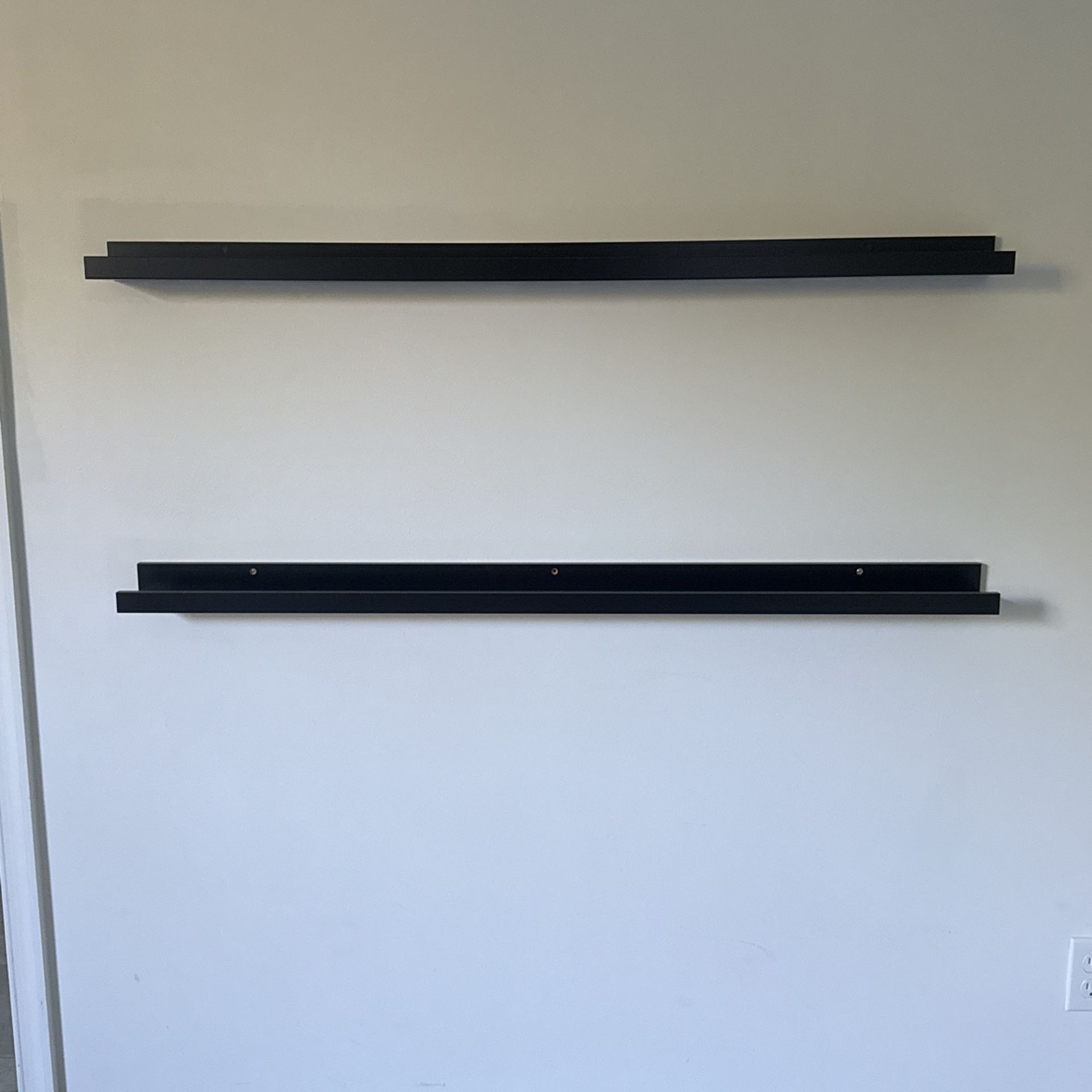 A Set Of Art Pieces Display Shelves