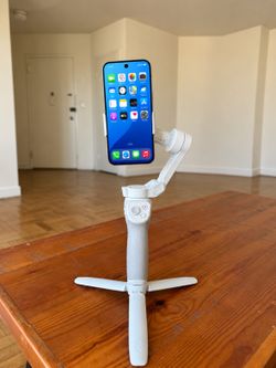 DJI OM 4 Smartphone Gimbal Stabilizer + Magnetic Clamp & Tripod