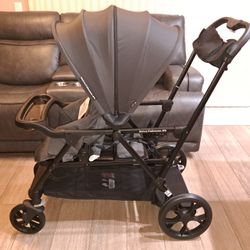 Joovy Caboose sit-and-stand double stroller. 