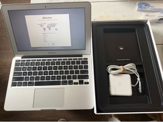 Apple MacBook Air 11-inch laptop with original box and manual works great