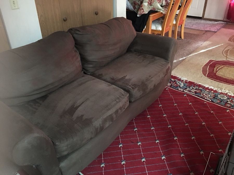 Couch it’s brown nothing wrong no rips or stains no pets or smoke it’s suede