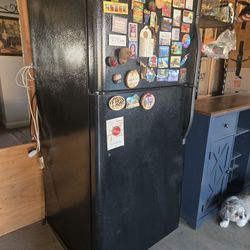 Black Refrigerater With Ice Mader