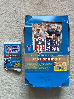 Various early 1990s sealed football card packs and cases