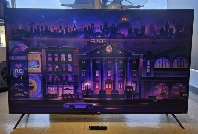 ONN 65" 4K UHD HDR10 Roku TV with Remote 815718-1