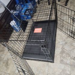 NEW  GAT FOR DOG  NEVER USED  36 TALL AND22 WIAD AND25 HIGcageY GOOD CONDITION 