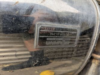 Nissan nizmo 350z exhaust has a dent