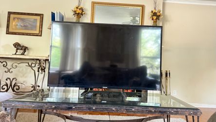 Toshiba 55” TV with remote.