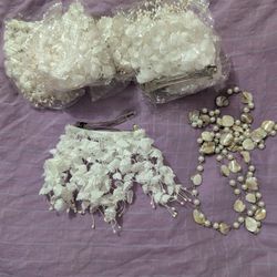 6 hair Clips And A Very Long Necklace 