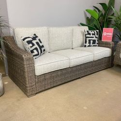 Beige Sofa w/ Cushion and Throw Pillows
