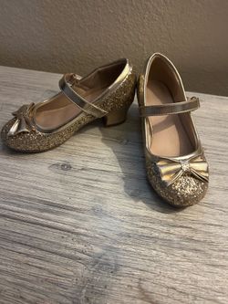 Size 12 girls glitter heels and child’s water float