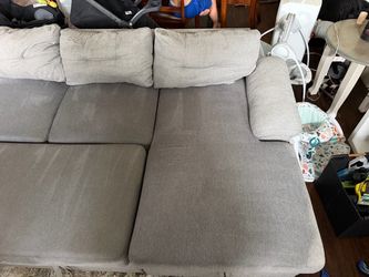 NEED GONE ASAP Great sectional couch with pullout and large storage.
