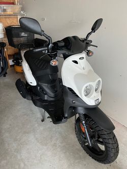 2 Genuine Scooter Company 50cc scooters