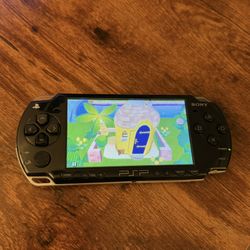 PSP 2000 with Games Movies and Charger