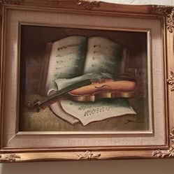 Canvas painting signed wood frame also a wood replica of a violin with artificial flowers in it all for $150