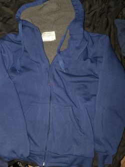 Large warm brand new sweatshirt with fur inside
