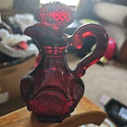 Avon burgundy glass cologne pitcher