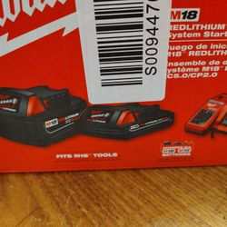 Milwaukee 5.0ah And 2.0ah Batteries And Charger