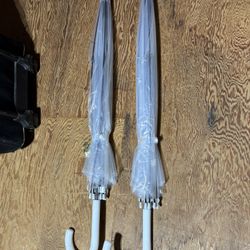 Two Clear Umbrellas