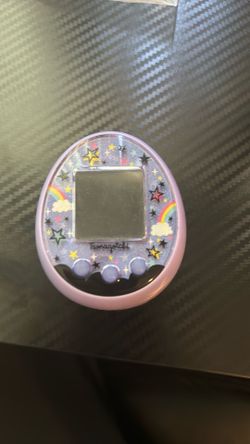 Tamagotchi meets in magical vision, purple