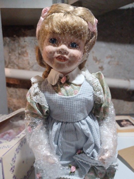 Vintage porcelain doll soft body blonde 16" tall matching bunny