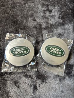Two brand new Range Rover hubcaps