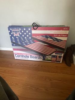Two sets of corn hole