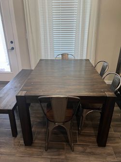 Wood table with bench and chairs