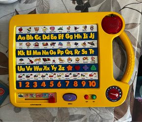 Recognizing alphabet, sounds, numbers, and spelling toy