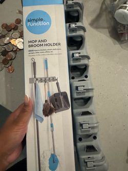 Mop and broom holder