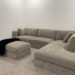 Sectional with storage ottoman