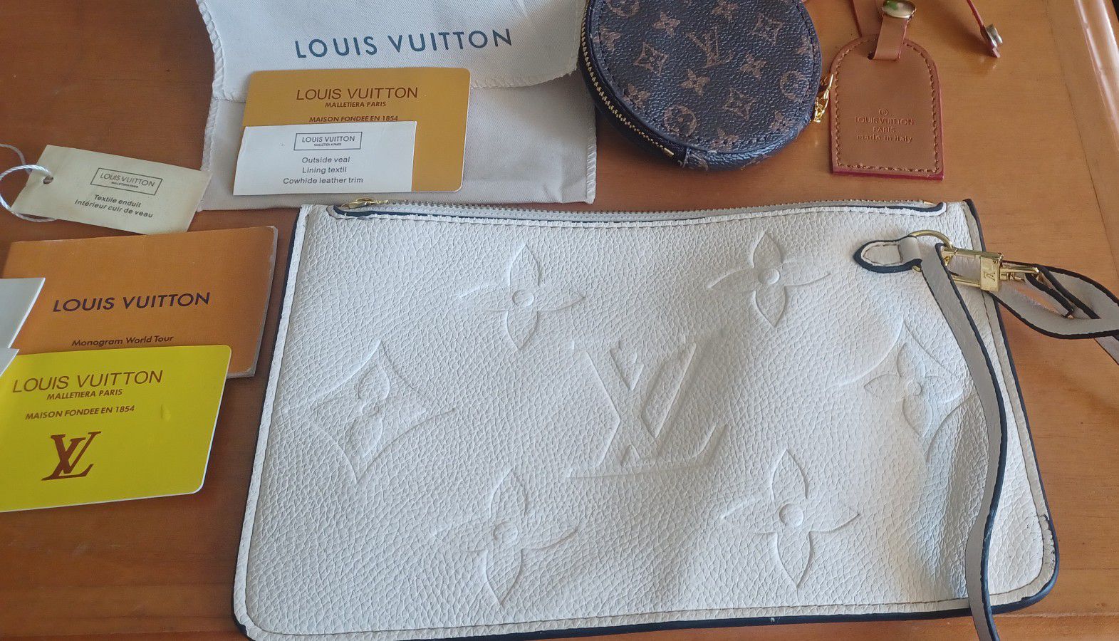 louis vuitton outside veal lining textile cowhide leather trim