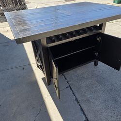 Solid wood dining table. Stool height