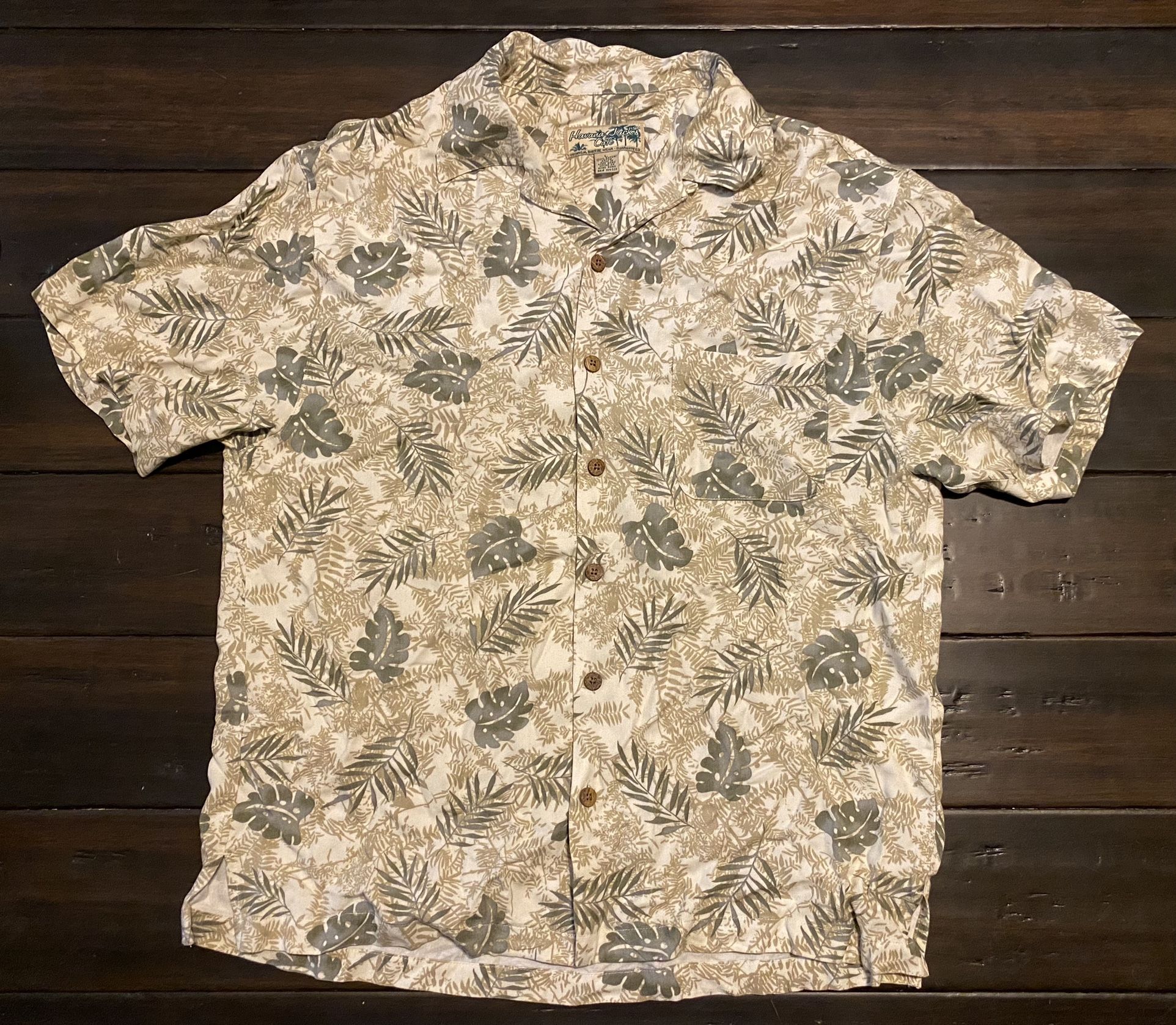 Havana Jacks Cafe Hawaiian Tropical Shirt Cream Floral Mens L 100% Rayon Button. Measures 23” pit to pit 28” top of shoulder to bottom hem.  