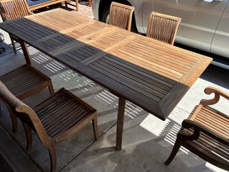 Teak Smith Rectangular Teak Expanding Table with 6 Matching Teak Smith Chairs  Located in concord Recently cleaned, sanded and teak oiled Teak wood is